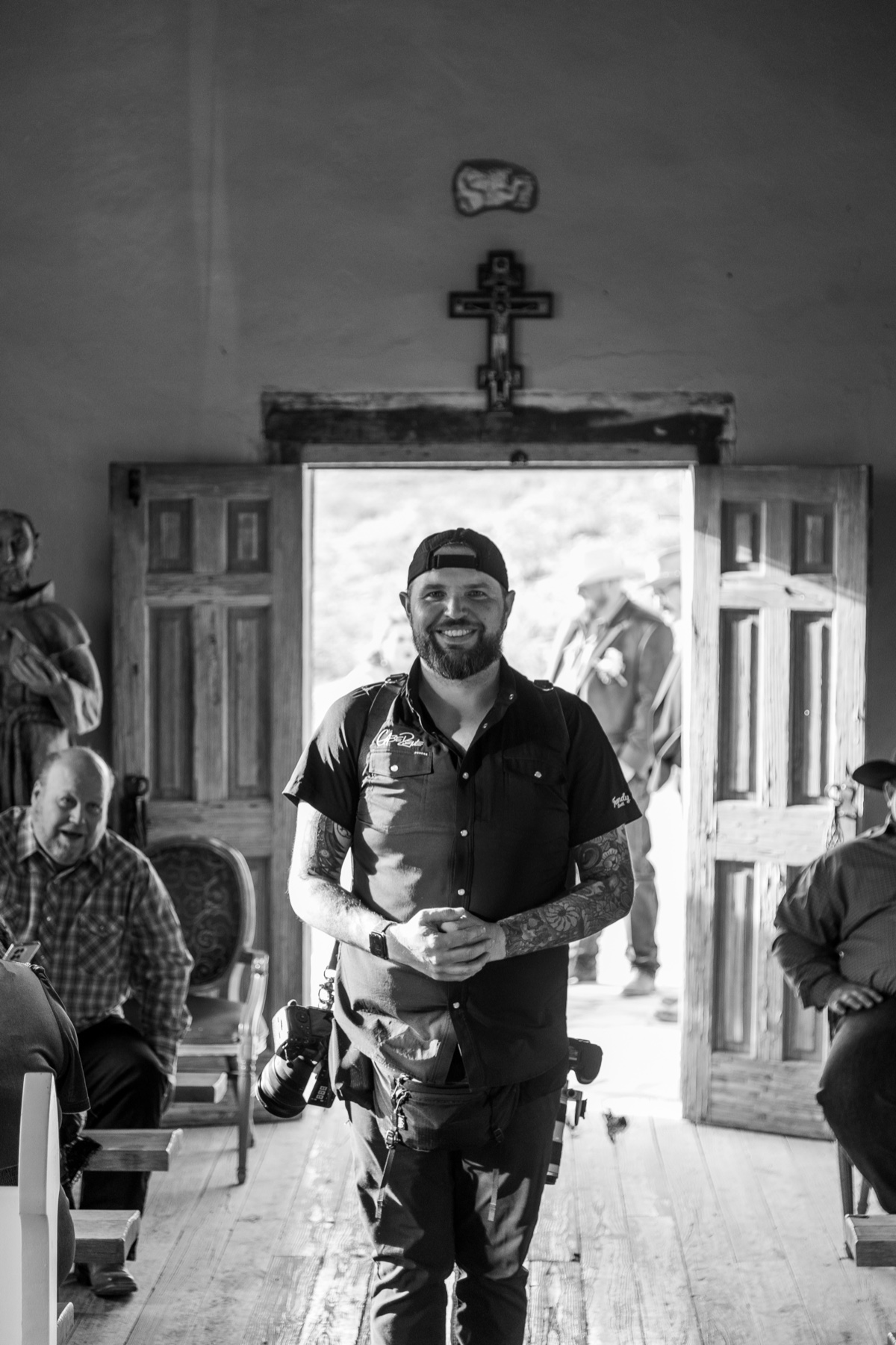 Gabe walking down the aisle at St. Agnes church in Terlingua