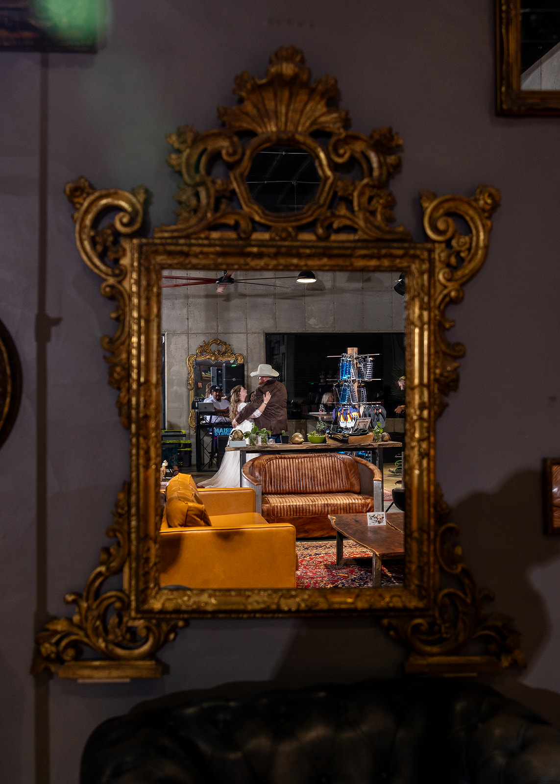 reflection of the couple dancing inside Venga, Terlingua, TX