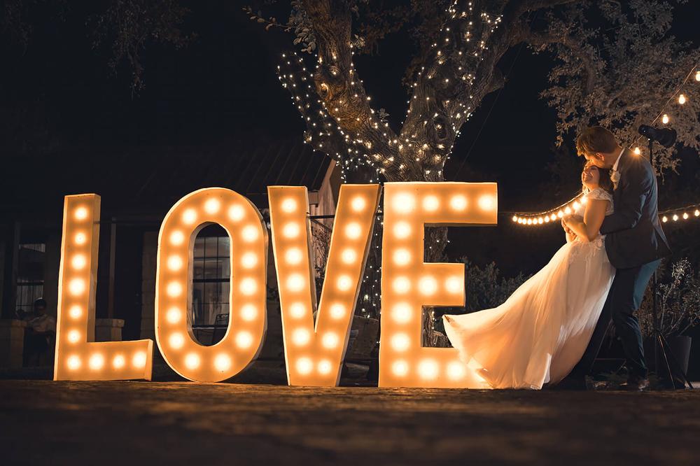 LOVE marquee letters at a Hill Country wedding reception by GR Weddings