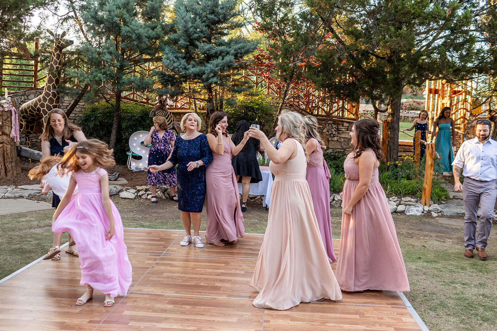 Packed dance floor at a Kerrville wedding reception by GR Weddings